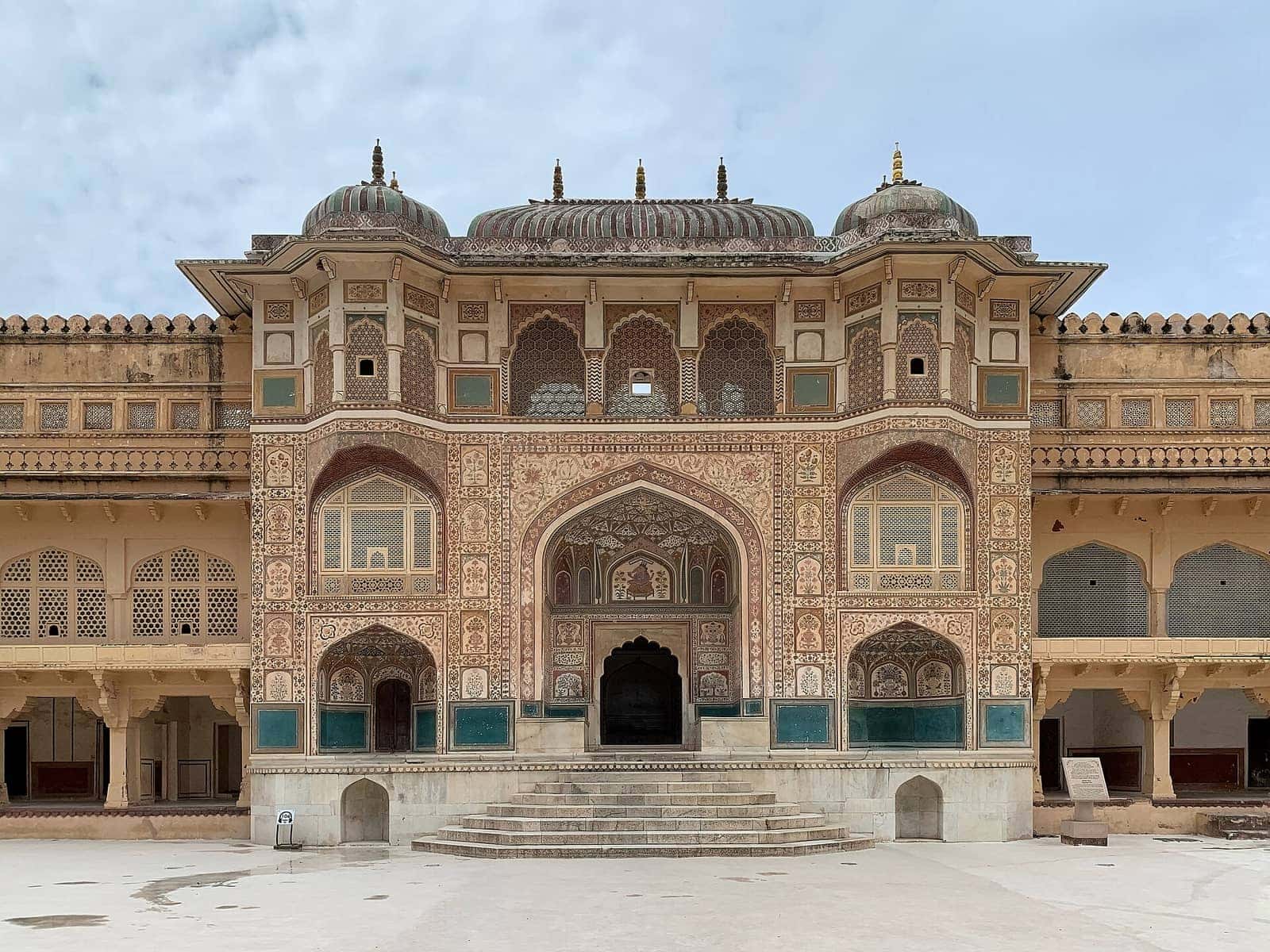 The intricately painted Ganesh Pol gateway at Amer Fort, Jaipur