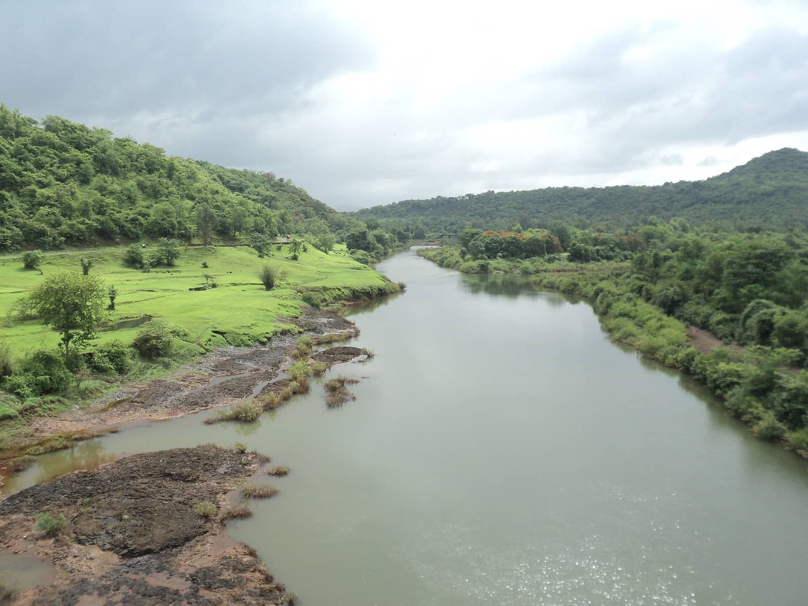 The Kali River winding between green hills in Uttara Kannada