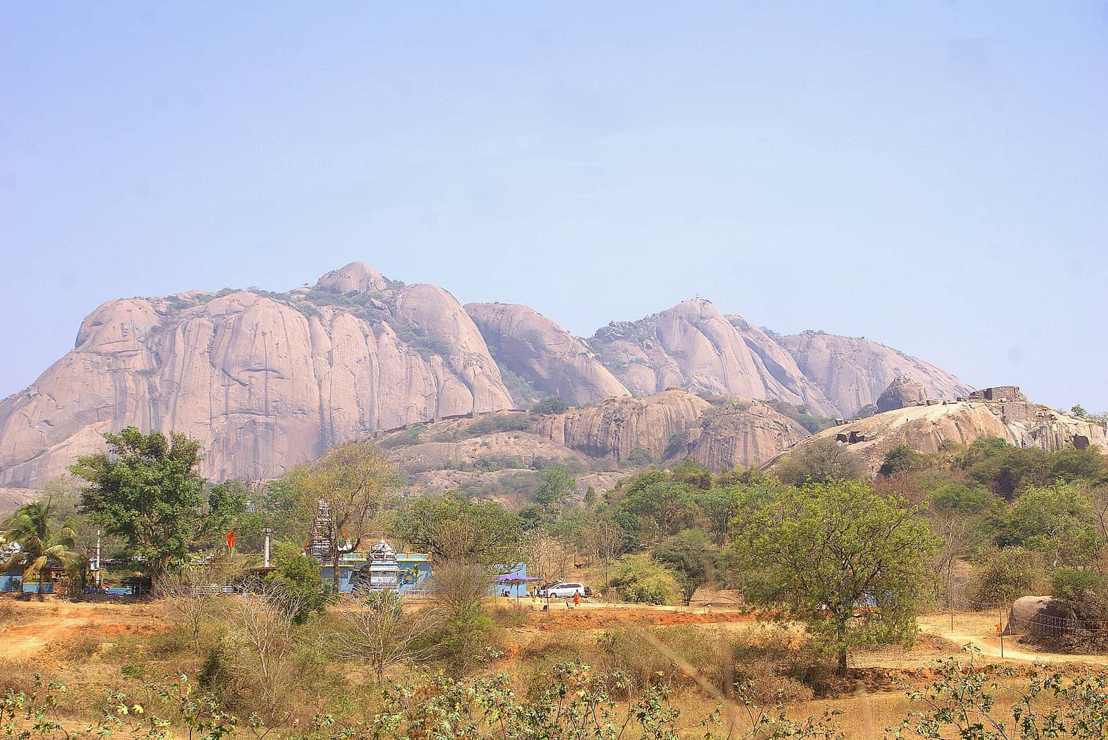 The Savandurga granite monolith rising above scrub forest
